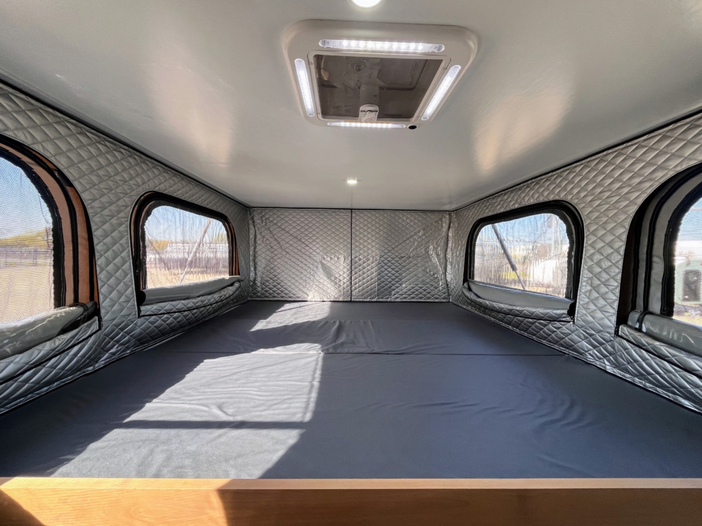 Roam Rider Truck Camper with a king size bed